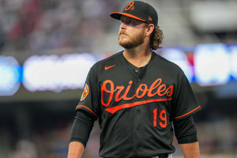 Jul 7, 2023; Minneapolis, Minnesota, USA; Baltimore Orioles starting pitcher Cole Irvin (19) walks off the mound after pitching against the Twins