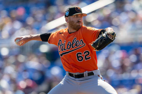 Mar 11, 2023; Dunedin, Florida, USA; Baltimore Orioles pitcher Reed Garrett (62) throws a pitch during a spring training game