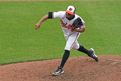 Jul 16, 2023; Baltimore, Maryland, USA; Baltimore Orioles pitcher Eduard Bazardo (67) delivers a pitch in a game