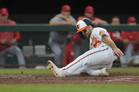 May 16, 2023; Baltimore, Maryland, USA; Baltimore Orioles right fielder Terrin Vavra (23) scores during a game against the Los Angeles Angels