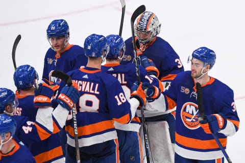 Apr 21, 2023; Elmont, New York, USA; New York Islanders celebrate the victory against the Carolina