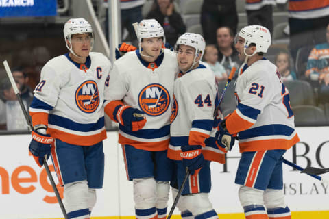 Mar 7, 2024; San Jose, California, USA; (L to R) New York Islanders left wing Anders Lee (27) ,