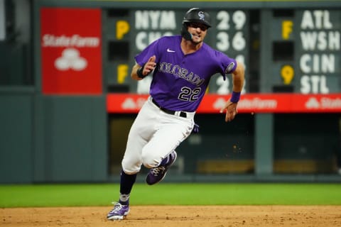 Jul 15, 2022; Denver, Colorado, USA Colorado Rockies center fielder Sam Hilliard (22) heads to third