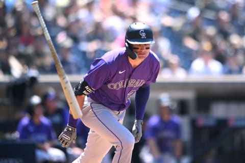 Jun 11, 2022; San Diego, California, USA; Colorado Rockies left fielder Sam Hilliard (22) tosses his