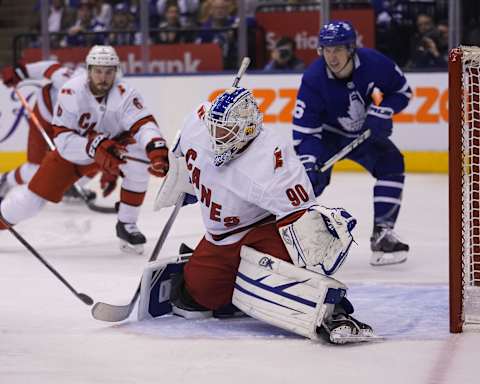 Feb 22, 2020; Toronto, Ontario, CAN; Carolina Hurricanes emergency goaltender David Ayres (90) defends the goal  against the Toronto Maple Leafs at Scotiabank Arena. Carolina defeated Toronto. Mandatory Credit: John E. Sokolowski-USA TODAY Sports