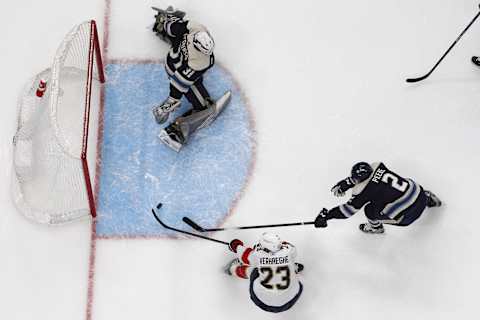 Apr 1, 2023; Columbus, Ohio, USA;  Florida Panthers Carter Verhaeghe (23) goes for the puck against