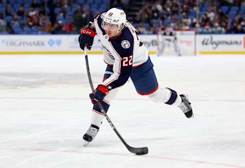 Dec 19, 2023; Buffalo, New York, USA;  Columbus Blue Jackets defenseman Jake Bean (22) takes a shot