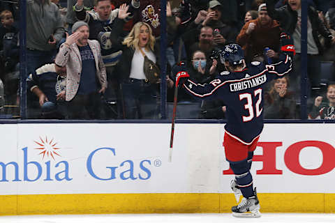 Mar 1, 2022; Columbus, Ohio, USA; Columbus Blue Jackets defenseman Jake Christiansen (32) celebrates a goal against the New Jersey Devils during the first period at Nationwide Arena. Mandatory Credit: Russell LaBounty-USA TODAY Sports