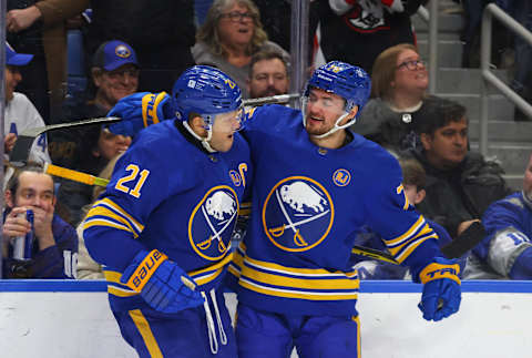 Dec 21, 2023; Buffalo, New York, USA;  Buffalo Sabres right wing Kyle Okposo (21) celebrates his