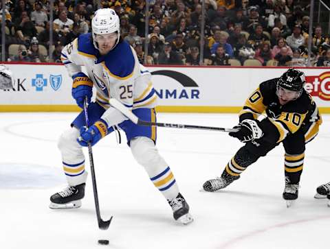 Jan 6, 2024; Pittsburgh, Pennsylvania, USA;  Buffalo Sabres defenseman Owen Power (25) handles the