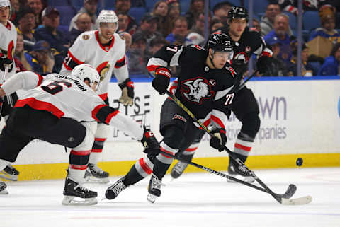 Jan 11, 2024; Buffalo, New York, USA;  Ottawa Senators defenseman Jakob Chychrun (6) knocks the puck