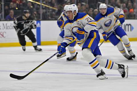 Jan 24, 2024; Los Angeles, California, USA; Buffalo Sabres right wing Kyle Okposo (21) handles the