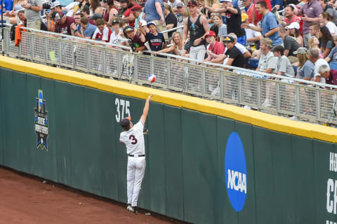 Jun 22, 2021; Omaha, Nebraska, USA; Virginia Cavaliers catcher Kyle Teel (3) tosses a beach ball