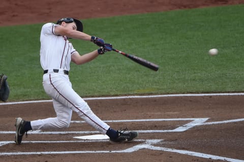 Jun 22, 2021; Omaha, Nebraska, USA; Virginia Cavaliers catcher Kyle Teel (3) singles in a run in the