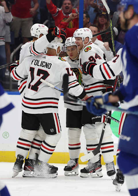 Nov 9, 2023; Tampa, Florida, USA; Chicago Blackhawks right wing Corey Perry (94) is congratulated