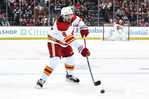 Ex-Calgary Flames defenseman Chris Tanev (8) 