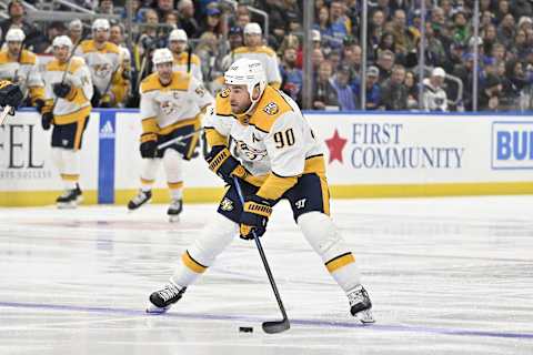 Nov 24, 2023; St. Louis, Missouri, USA;  Nashville Predators center Ryan O'Reilly (90) controls the