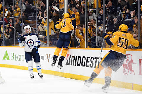 Nov 26, 2023; Nashville, Tennessee, USA; Nashville Predators center Yakov Trenin (13) celebrates by