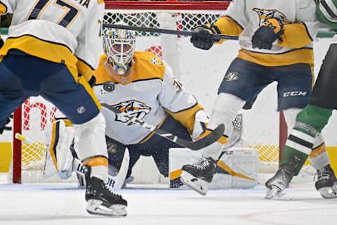 Jan 6, 2024; Dallas, Texas, USA; Nashville Predators goaltender Kevin Lankinen (32) stops a shot