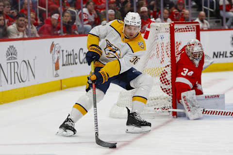 Dec 29, 2023; Detroit, Michigan, USA; Nashville Predators left wing Cole Smith (36) handles the puck