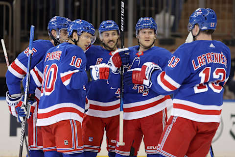 Feb 20, 2024; New York, New York, USA; New York Rangers defenseman Adam Fox (23) celebrates his goal