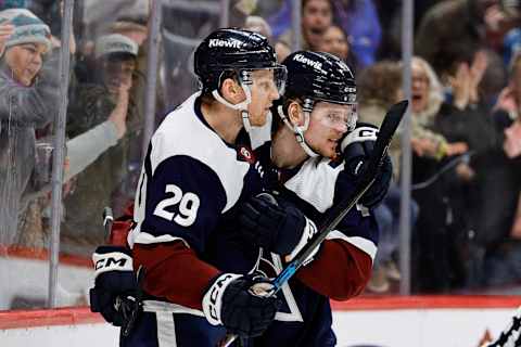 Feb 18, 2024; Denver, Colorado, USA; Colorado Avalanche center Nathan MacKinnon (29) celebrates his