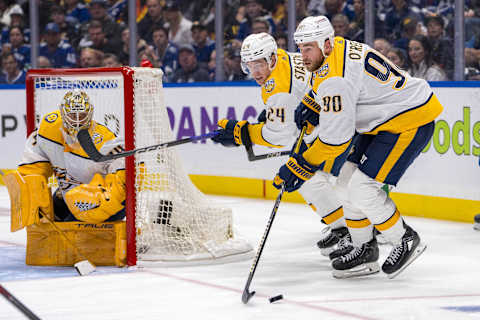 Apr 23, 2024; Vancouver, British Columbia, CAN; Nashville Predators goalie Juuse Saros (74) and