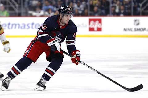 Mar 28, 2024; Winnipeg, Manitoba, CAN; Winnipeg Jets center Sean Monahan (23) skates through the neutral zone in the second period against the Vegas Golden Knights at Canada Life Centre. Mandatory Credit: James Carey Lauder-USA TODAY Sports