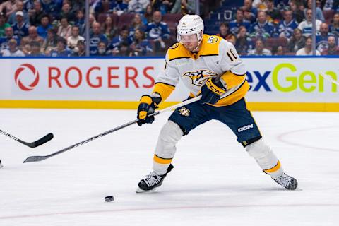 Apr 21, 2024; Vancouver, British Columbia, CAN; Nashville Predators forward Colton Sissons (10) handles the puck against the Vancouver Canucks during the second period in game one of the first round of the 2024 Stanley Cup Playoffs at Rogers Arena. Mandatory Credit: Bob Frid-USA TODAY Sports