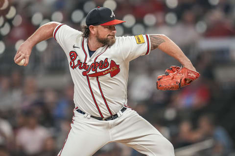 Aug 23, 2023; Cumberland, Georgia, USA; Atlanta Braves relief pitcher Kirby Yates (22) pitches