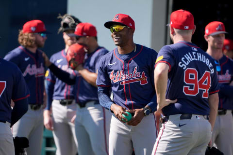 Feb 15, 2024; North Port, FL, USA; Atlanta Braves relief pitcher Raisel Iglesias (26) talks with