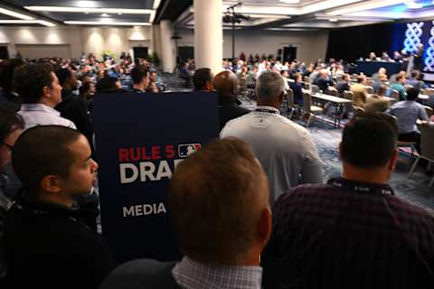 Members of the media look on during the MLB Rule 5 Draft at the 2022 MLB Winter Meetings