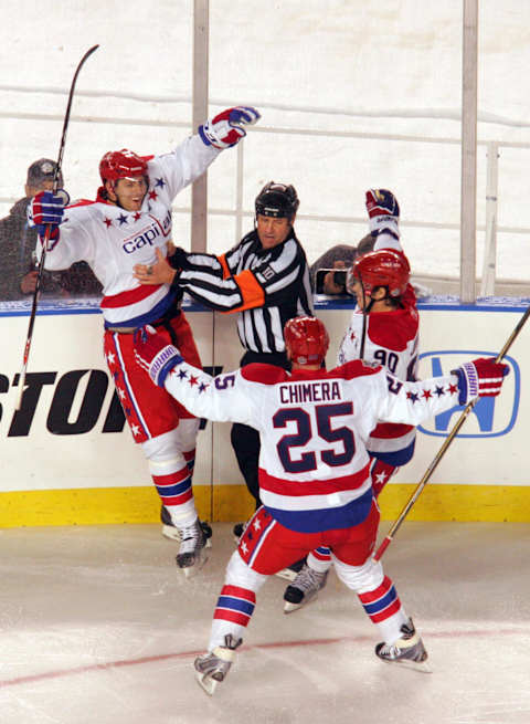 Eric Feher, Marcus Johansson, Jason Chimera, Washington Capitals Mandatory Credit: Charles LeClaire-USA TODAY Sports