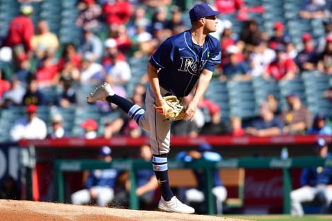 May 11, 2022; Anaheim, California, USA; Tampa Bay Rays starting pitcher Shane McClanahan (18) throws