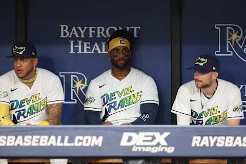 Mar 30, 2023; St. Petersburg, Florida, USA; Tampa Bay Rays center fielder Jose Siri (22, first baseman Yandy Diaz (2) and second baseman Brandon Lowe (8) look on before the game against the Detroit Tigers at Tropicana Field. Mandatory Credit: Kim Klement-Imagn Images