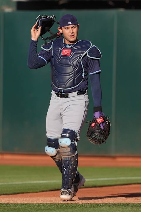 Aug 21, 2024; Oakland, California, USA; Tampa Bay Rays catcher Alex Jackson (28) before the game against the Oakland Athletics at Oakland-Alameda County Coliseum. Mandatory Credit: Darren Yamashita-Imagn Images