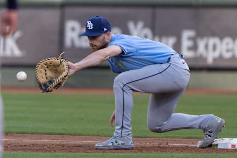 Aug 19, 2024; Oakland, California, USA; Tampa Bay Rays second base Brandon Lowe (8) catches the ball for an out during the first inning against the Oakland Athletics at Oakland-Alameda County Coliseum. Mandatory Credit: Stan Szeto-Imagn Images