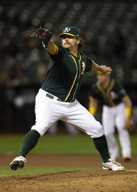 Sep 22, 2021; Oakland, California, USA; Oakland Athletics pitcher Andrew Chafin (39) delivers