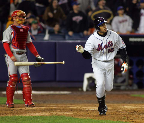 The Mets Carlos Beltran tosses his bat aside after hitting a three-run homer in the 7th inning, as