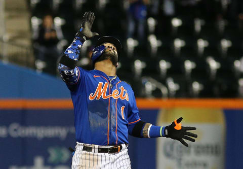 Sep 28, 2021; New York City, New York, USA; New York Mets third baseman Jonathan Villar (1) reacts