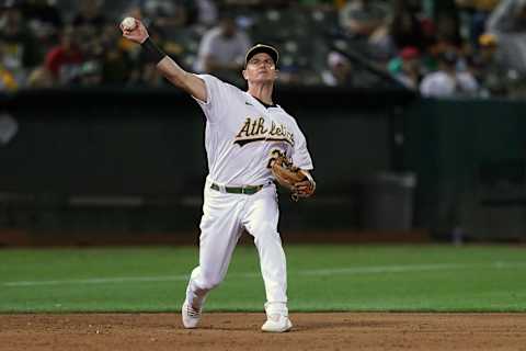 Aug 27, 2021; Oakland, California, USA; Oakland Athletics third baseman Matt Chapman (26) throws the