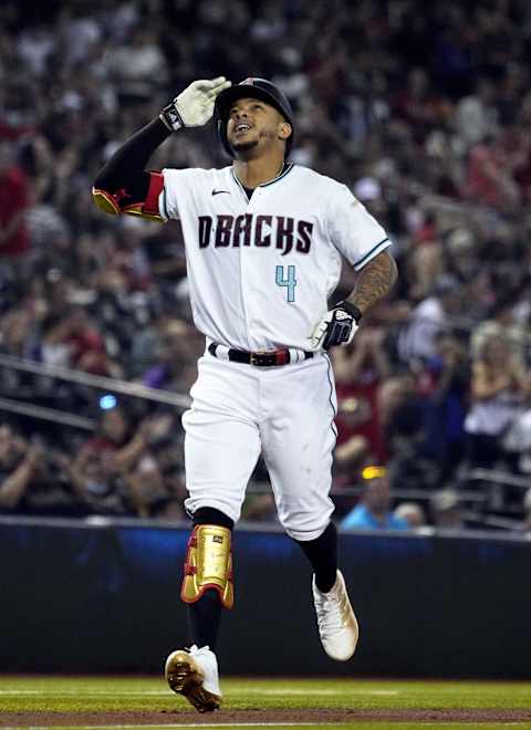 Oct 1, 2021; Phoenix, Arizona, USA; Arizona Diamondbacks second baseman Ketel Marte (4) reacts after