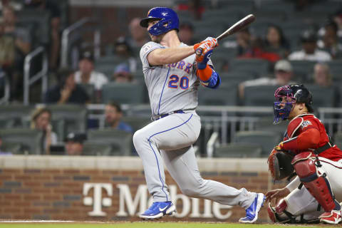 Oct 1, 2021; Atlanta, Georgia, USA; New York Mets first baseman Pete Alonso (20) hits a single