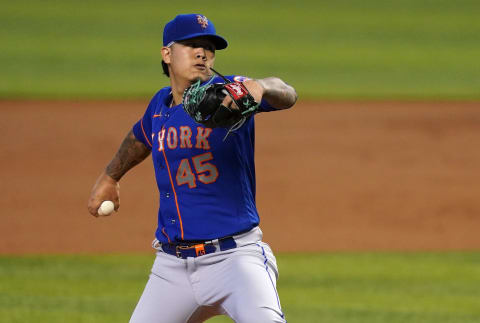 May 23, 2021; Miami, Florida, USA; New York Mets starting pitcher Jordan Yamamoto (45) delivers a