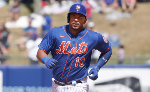 Mar 26, 2022; Port St. Lucie, Florida, USA;  New York Mets third baseman Eduardo Escobar runs around