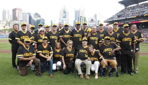 Jul 20, 2019; Pittsburgh, PA, USA;  Pittsburgh Pirates players and widows and front office personnel