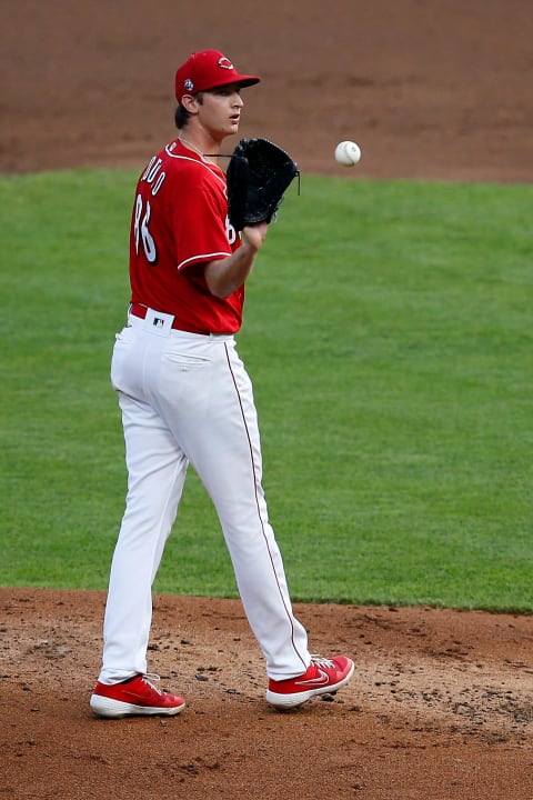 Cincinnati Reds starting pitcher Nick Lodolo (86) receives a new ball after giving up a two-run home run.