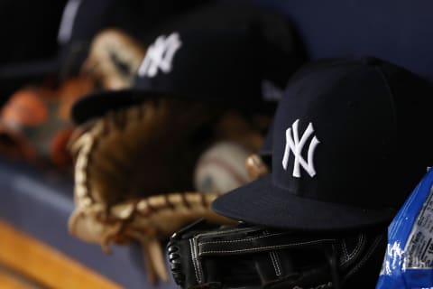 A general view of New York Yankees hat and glove.