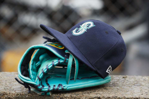 Hat and glove of Seattle Mariners.