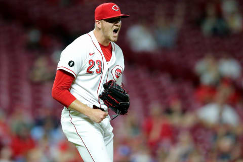 Cincinnati Reds starting pitcher Jeff Hoffman (23) reacts after a strikeout.